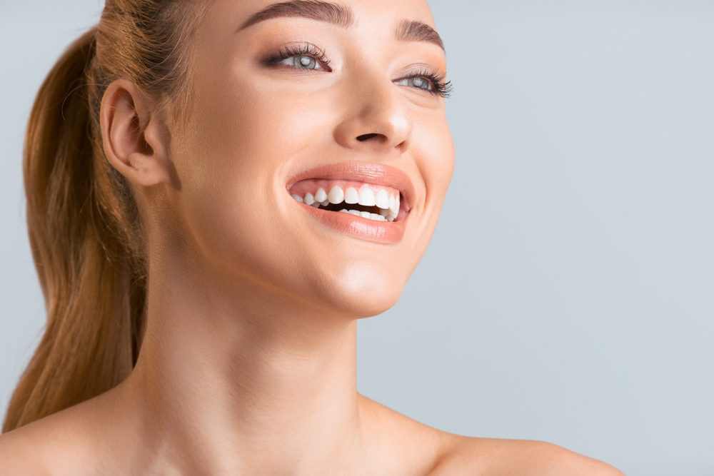 Dental Implants Clairemont: Confident, Full Smile Results Close-up of a woman's confident, full smile, reflecting the results dental implants in Clairemont patients can expect