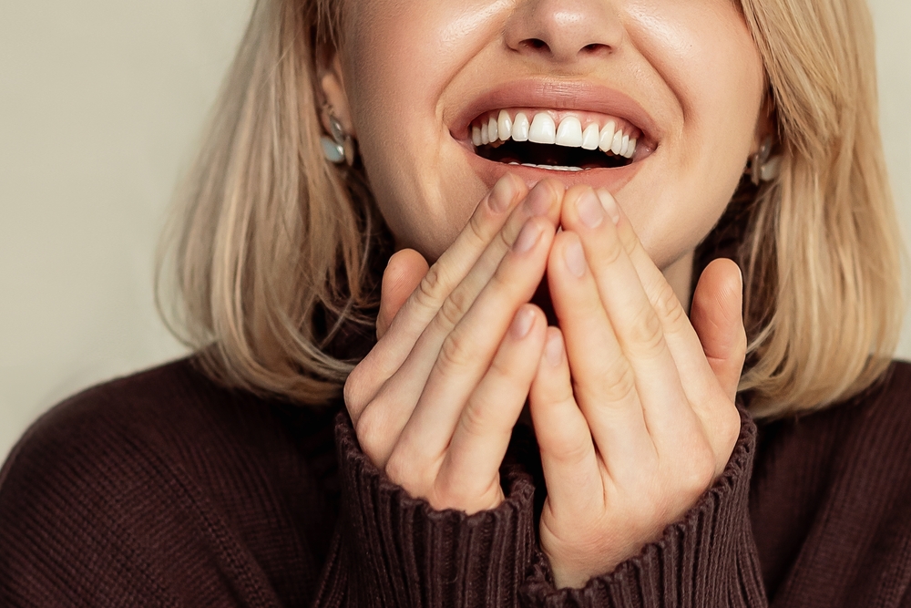 Healthy Gums and Smile: Periodontal Care in the San Diego Community Woman with a healthy smile, the kind of result gum disease treatment can help patients in the San Diego community achieve